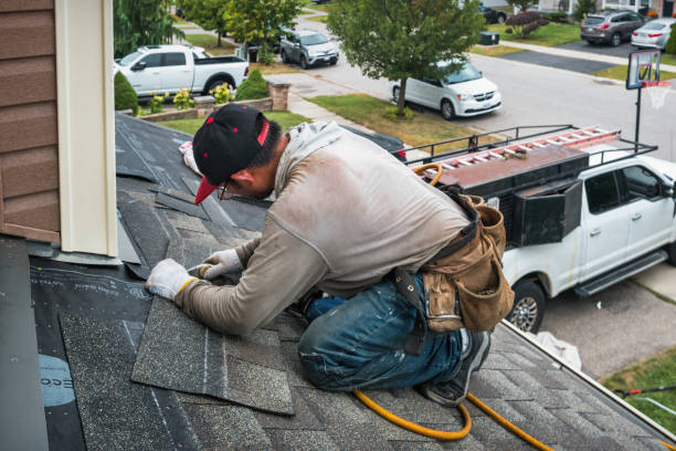 Professional Storm Damage Roof Repair technician working in Ruby, NY